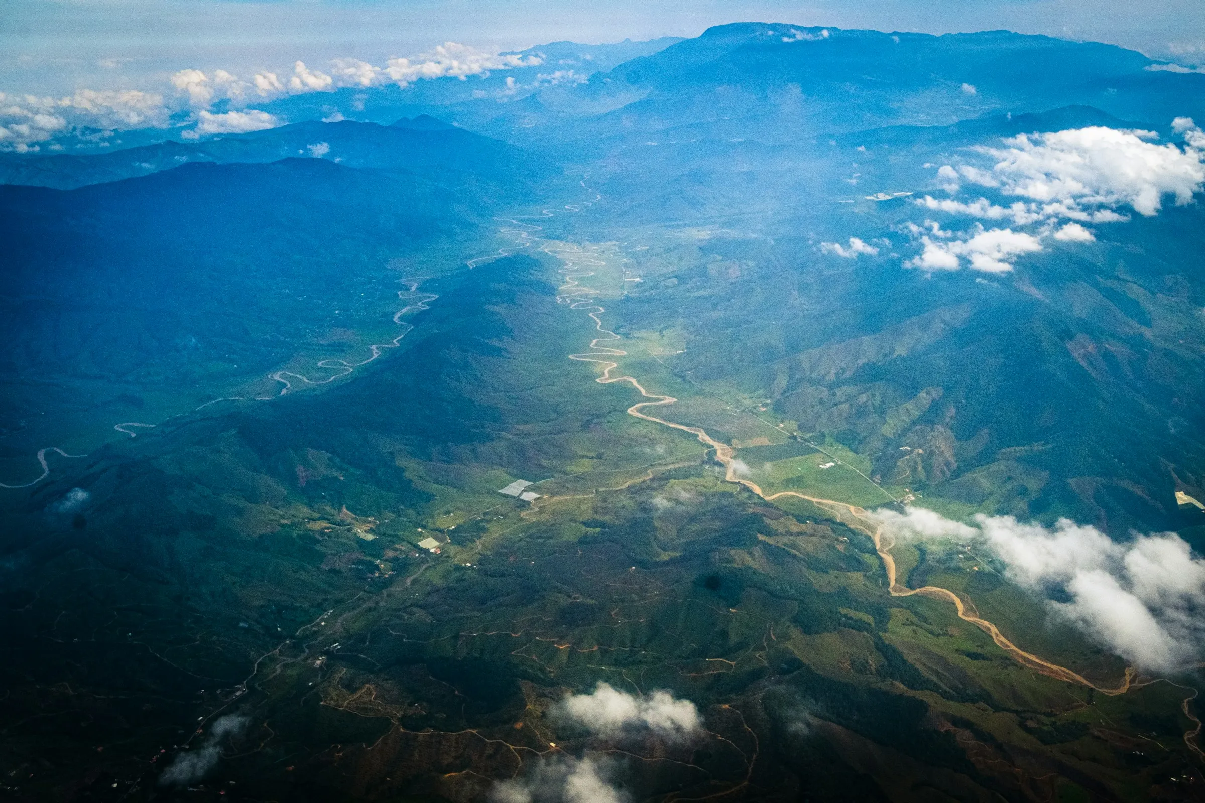 Aerial view of an Andean valley and river near Medellín